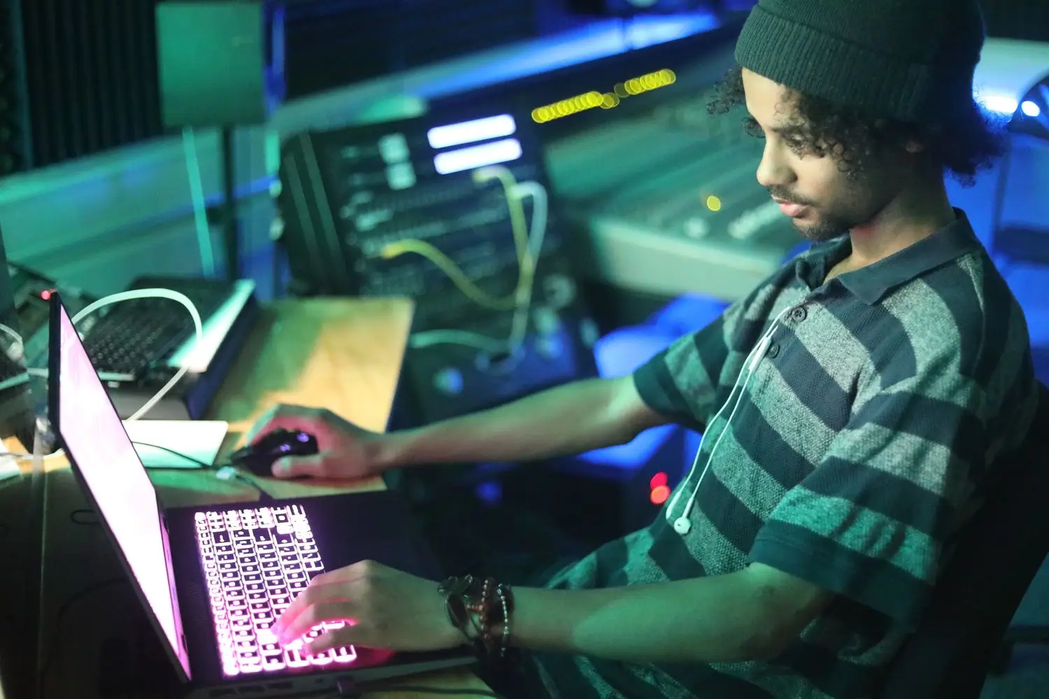 student in recording student in green light