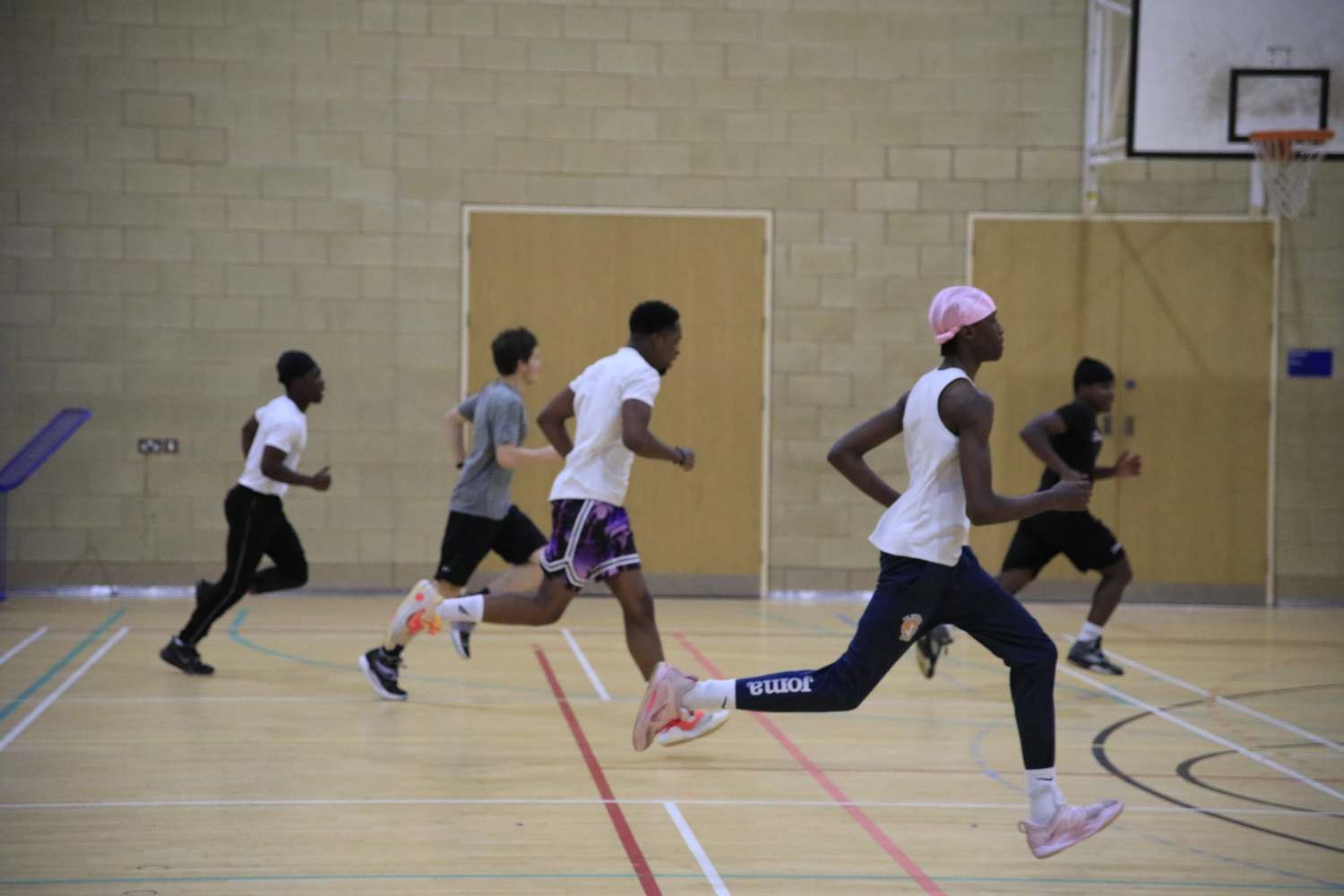 sport students playing in sports hall