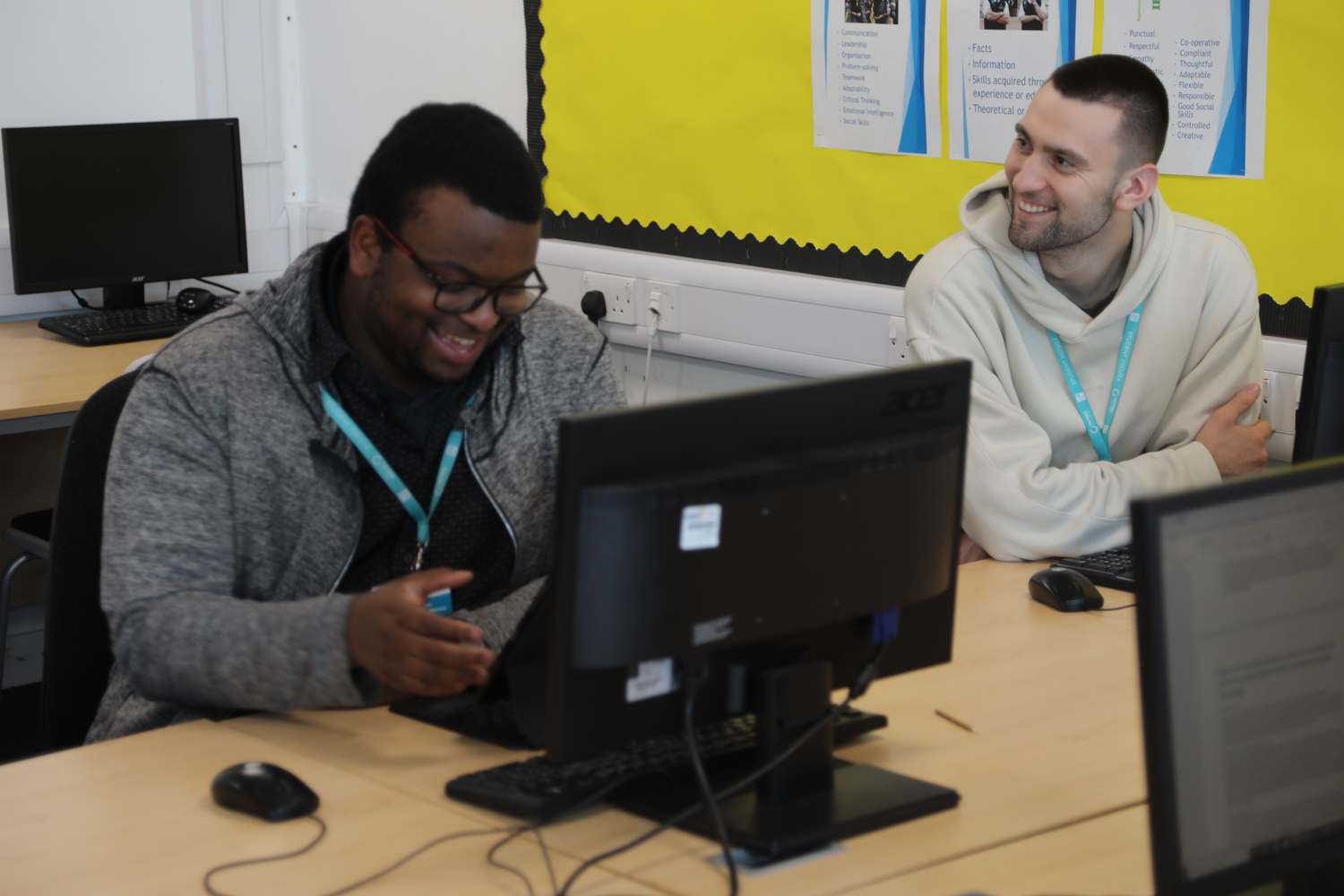 computing students fixing computer