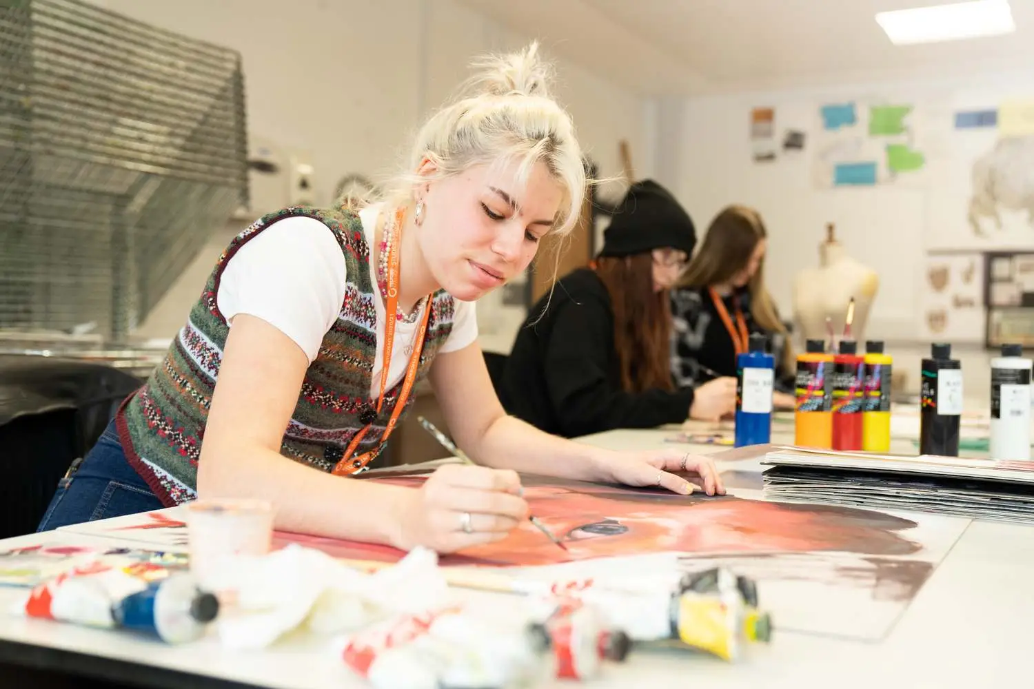 creative student completing her artwork