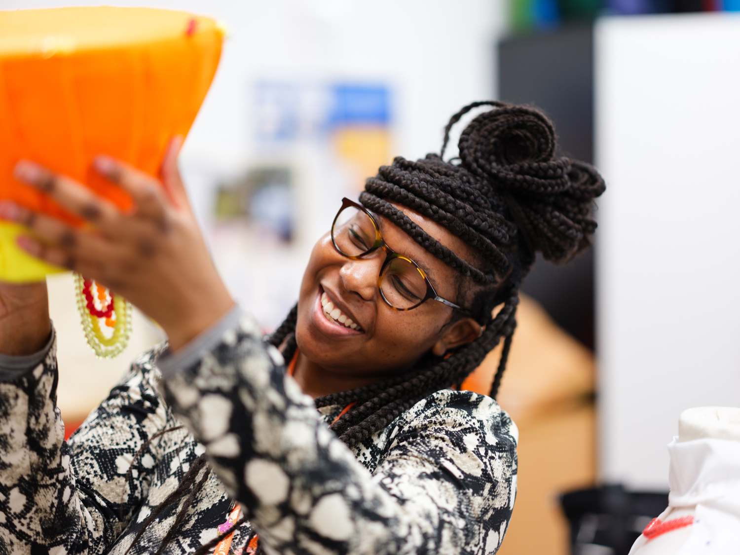 black female student in creative workshop