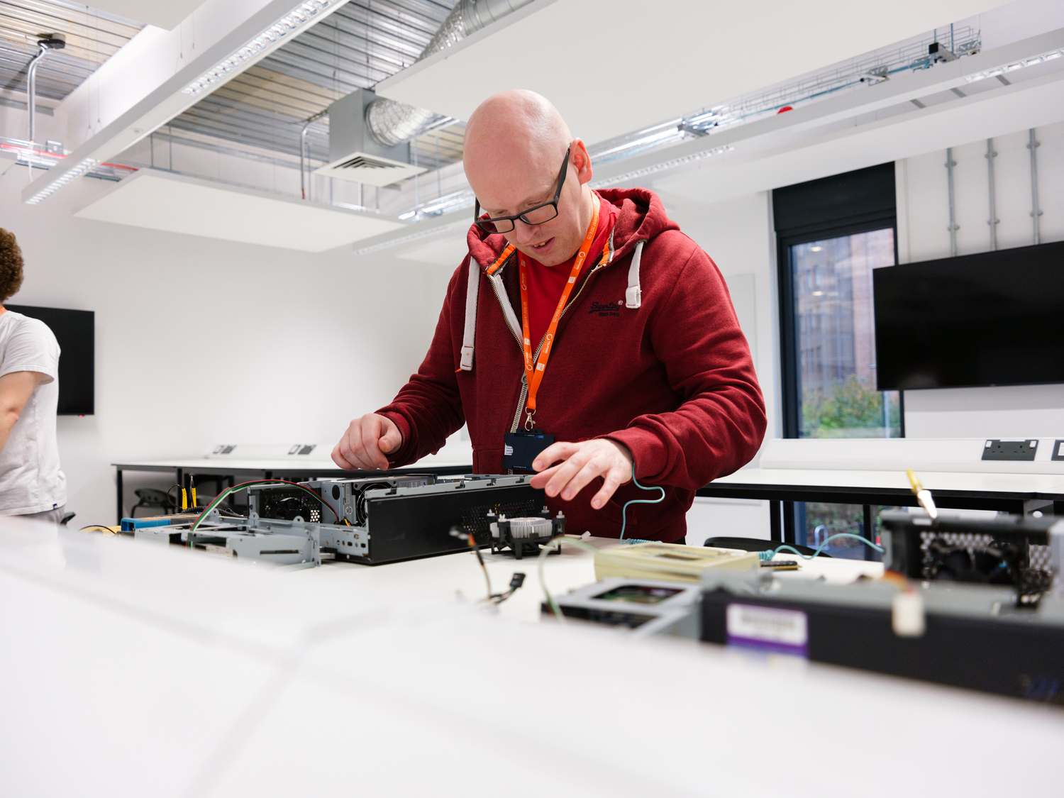 tutor working on machinery