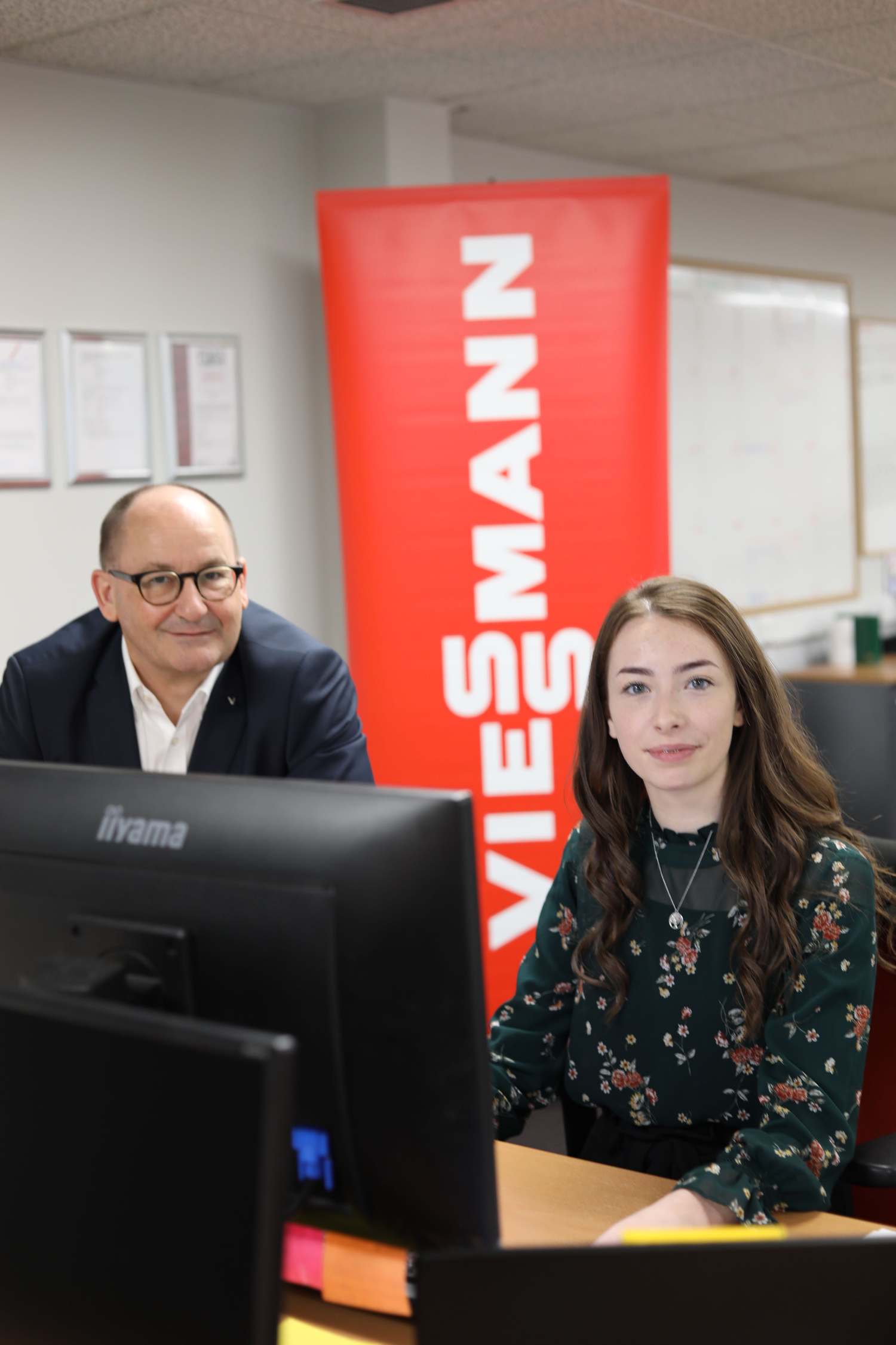 tutor and student at desk