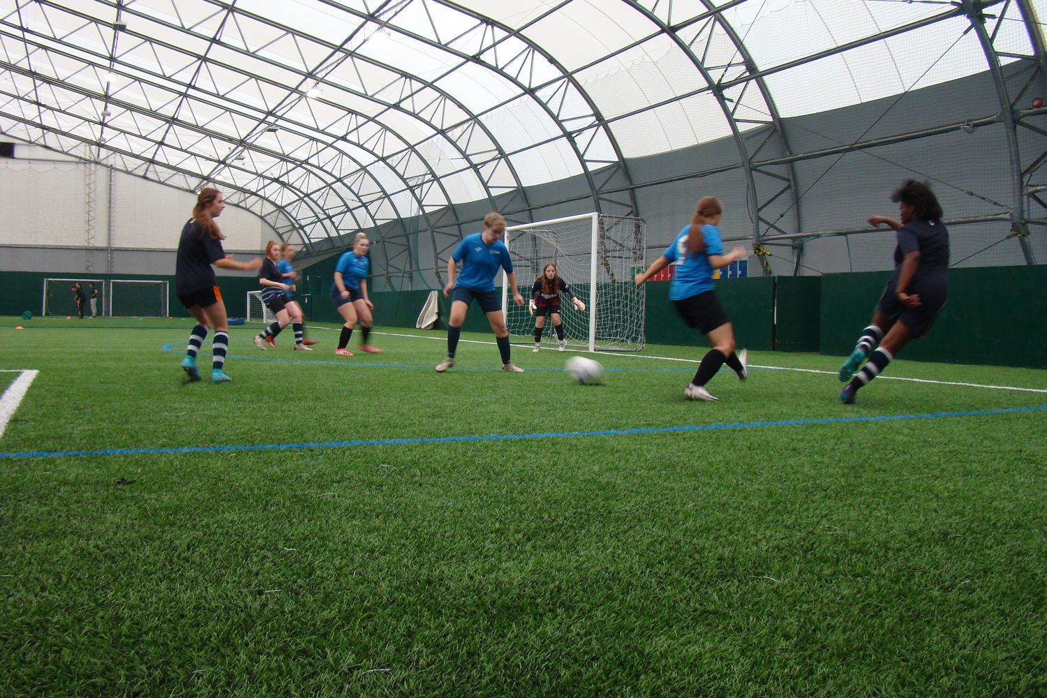 football pitch with students playing