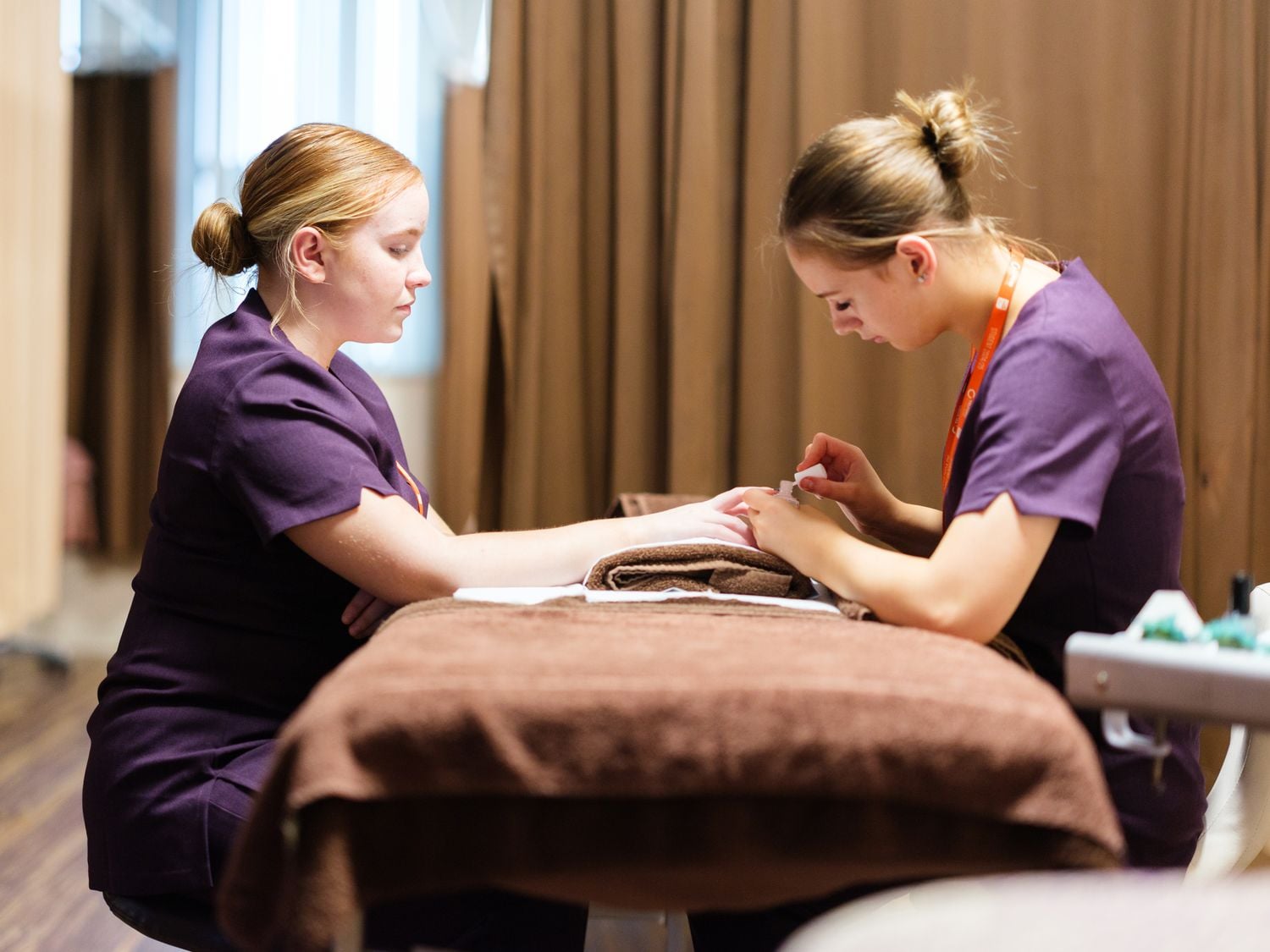 hair and beauty student in the retreat doing nails