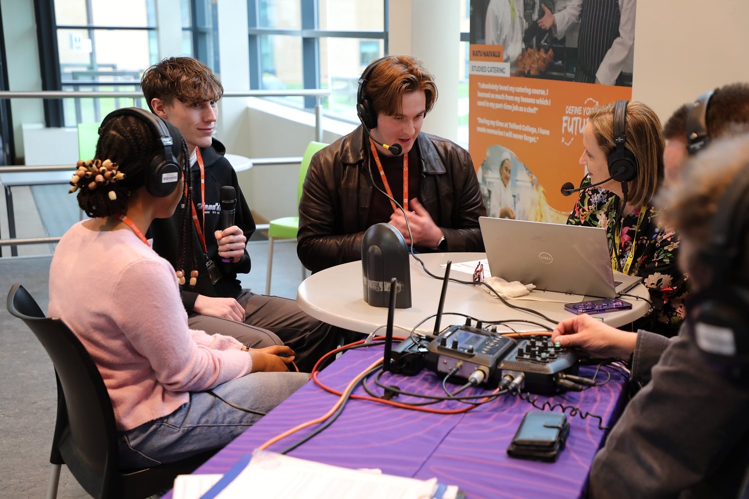 BBC talking to three students around a table