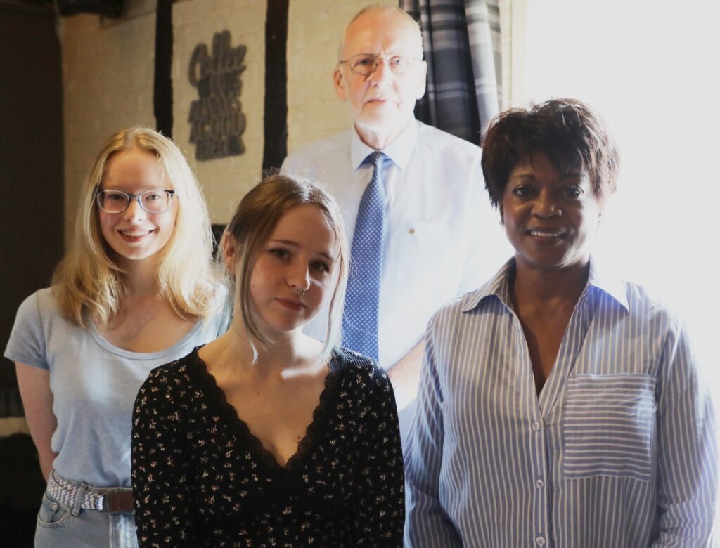 Dan Scollard-Kerr, and Sharon Wyatt from the Rotary Club of Wellington with Lily Titley and Ella Hope