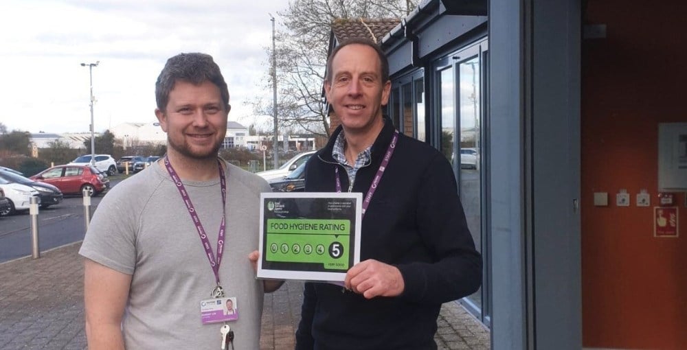 Telford College catering tutors Rob Lee and Andy Minchin celebrate the five-star rating for The Orange Tree