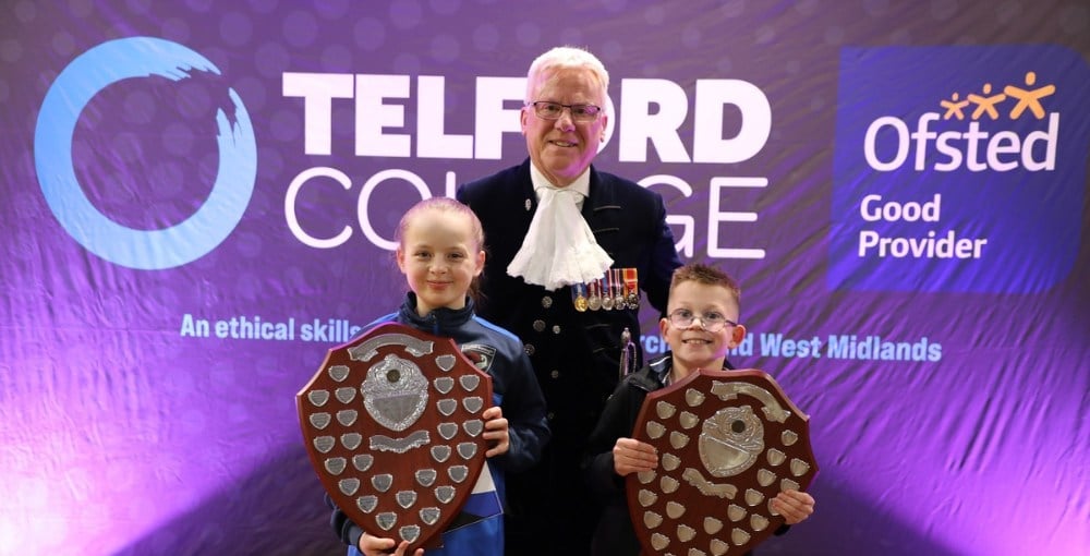 2 students with the High Sheriff Brian Welti