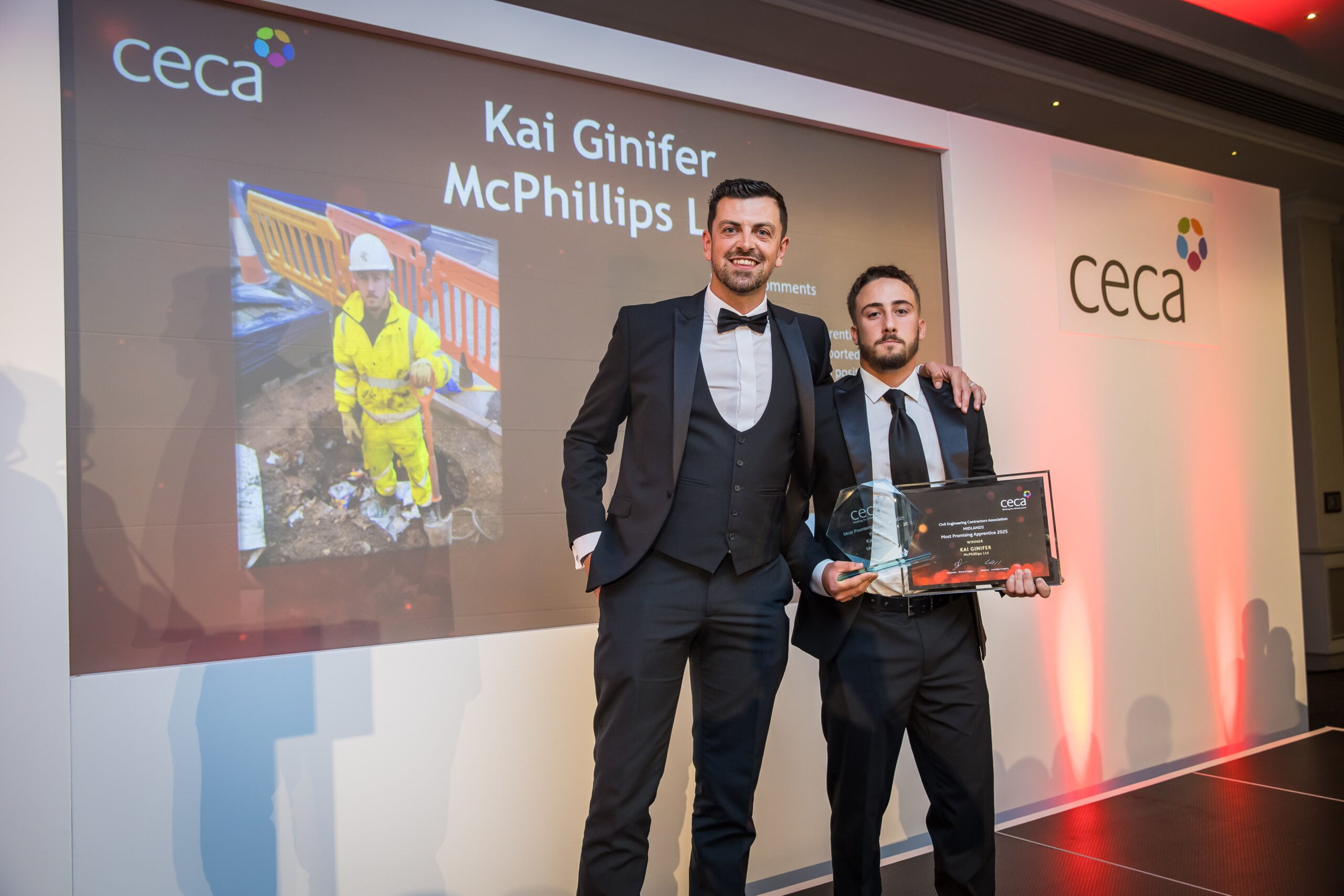 McPhillips apprentice Kai Ginifer receives his award from Sean McCormick at the 2025 CECA West Midlands Awards (1)