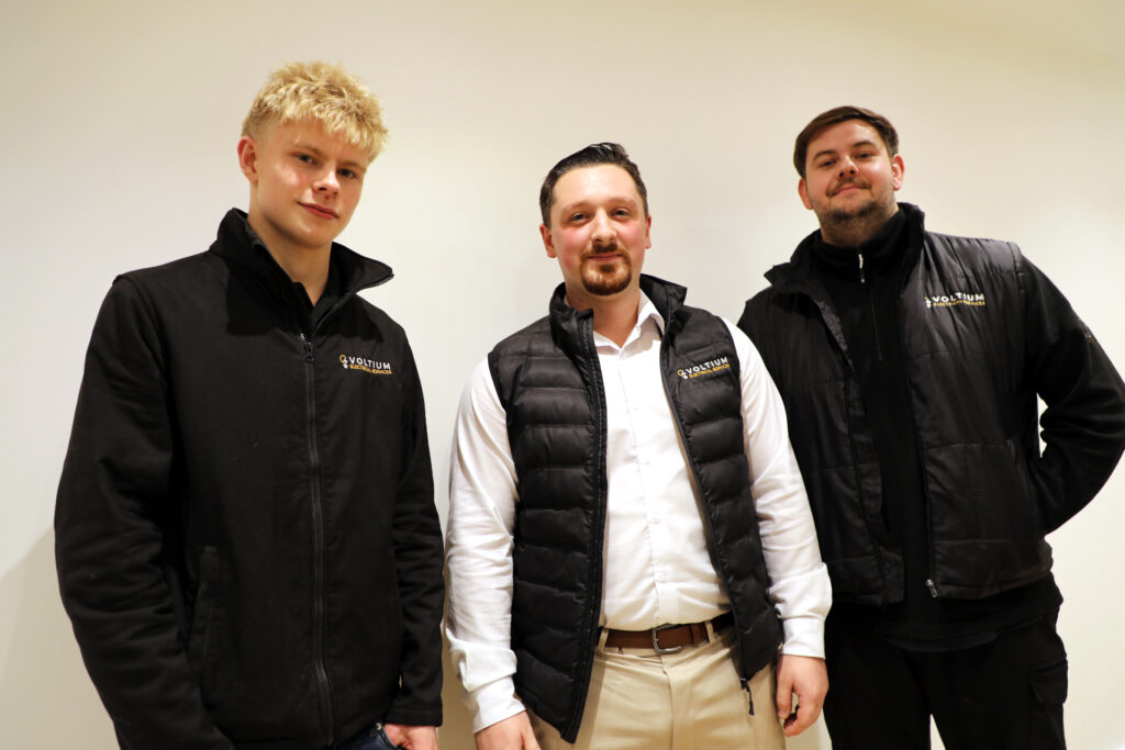Archie with his bosses