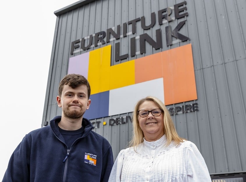 Julie Reynolds, General Manager at Furniture Link, with Alex Cochraine outside the Hortonwood base