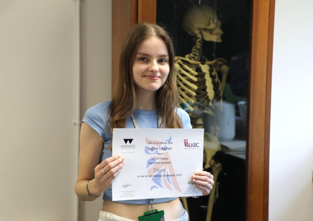 Sophie with her certificate