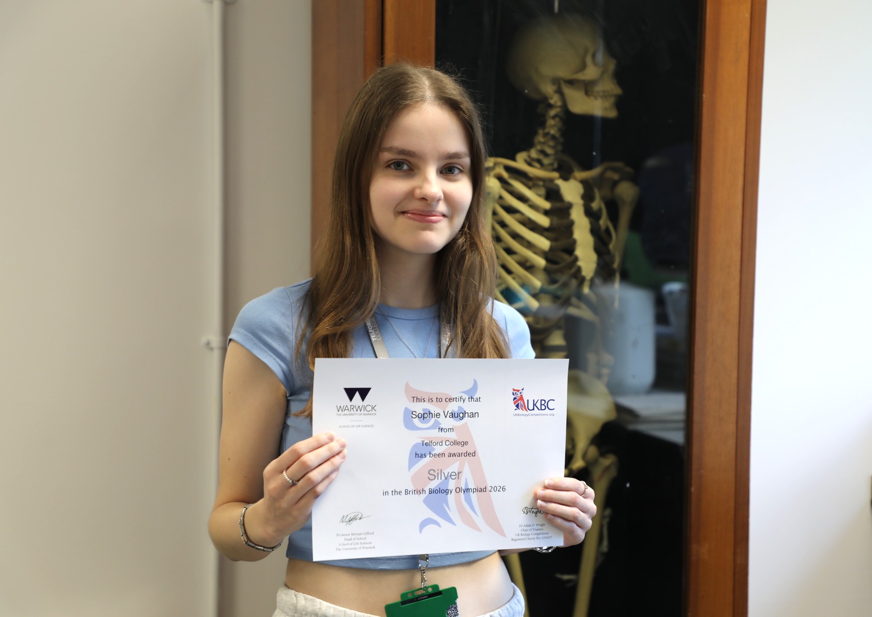 Sophie with her certificate