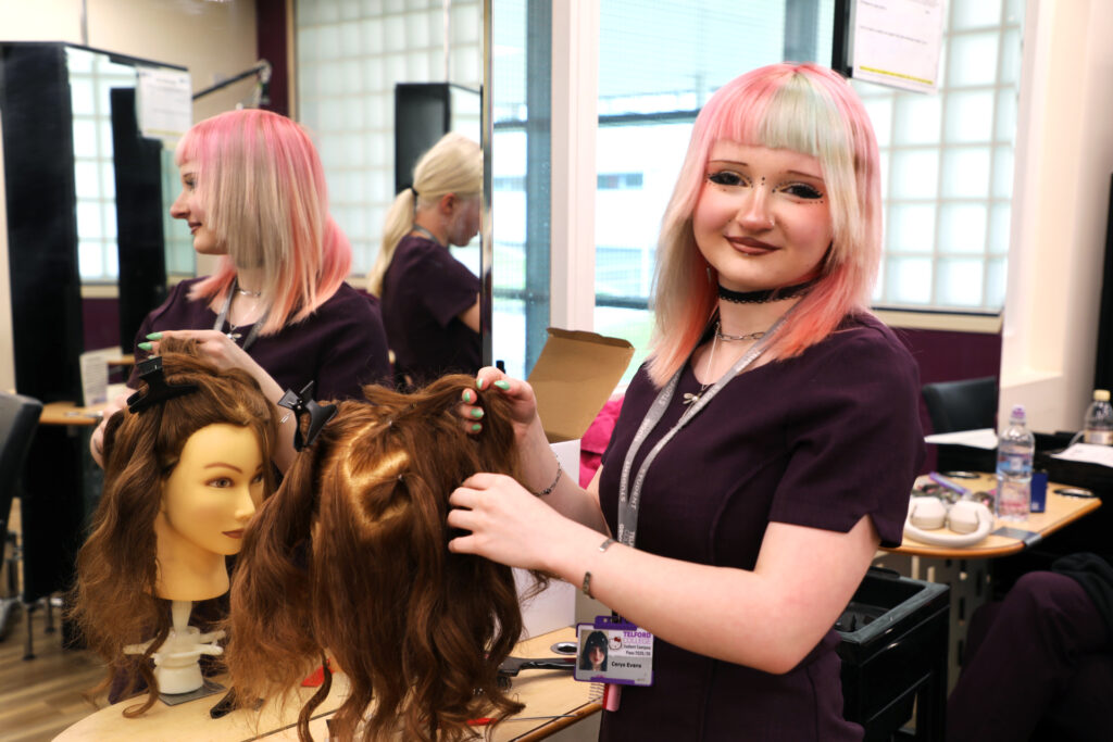 Hairdressing student Cerys Evans has to create three different looks at the national qualifiers